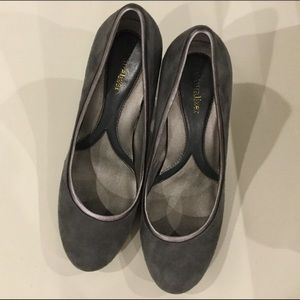 Naturalized woman’s suede shoes.